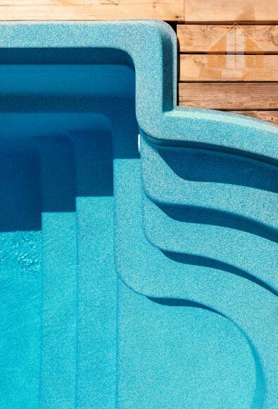 Molded fiberglass pool shell installation